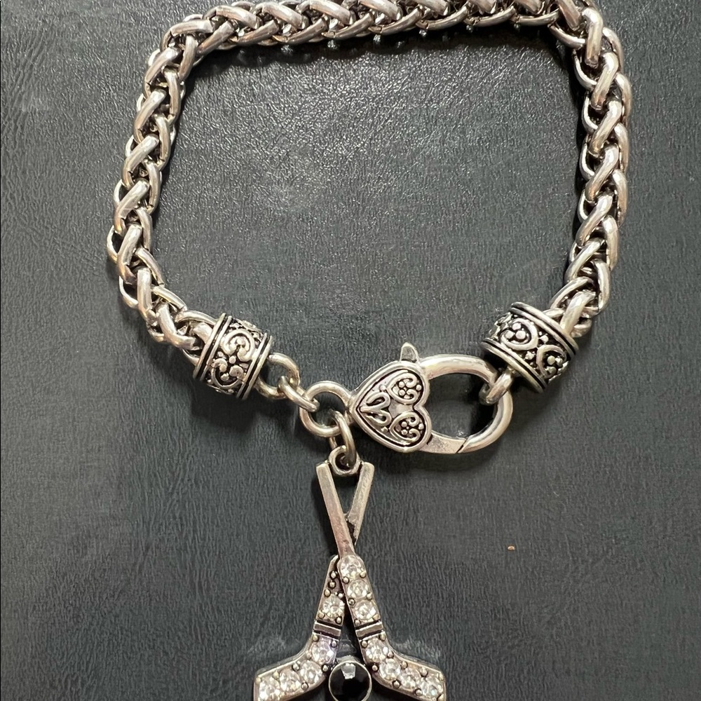 Silver bracelet with rhinestones hockey sticks